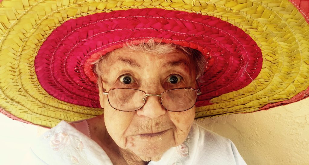 mortgage at 95 - elderly lady with a sun hat